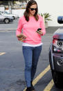 Celebrities in neon fashion: Jennifer Garner wrapped up warm in a neon pink jumper.<br><br>[Rex]