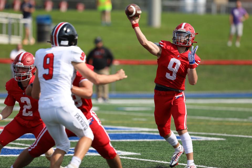 Fairport's quarterback Jackson Rucker throws a pass during their football game at Fairport High in Fairport, NY on September 17, 2022.