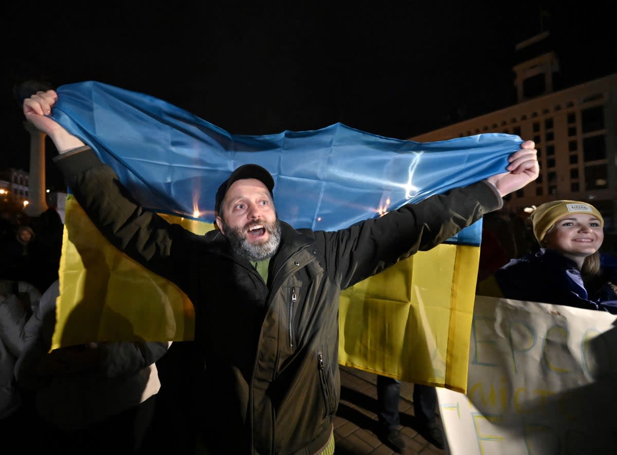 Ukrainians return to Kyiv’s Maidan Square to celebrate the liberation of Kherson in November 2022 (AFP/Getty)