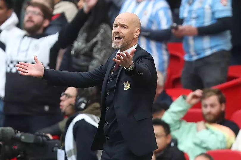 Erik ten Hag puts his arms out to appeal a decision against Coventry City at Wembley.
