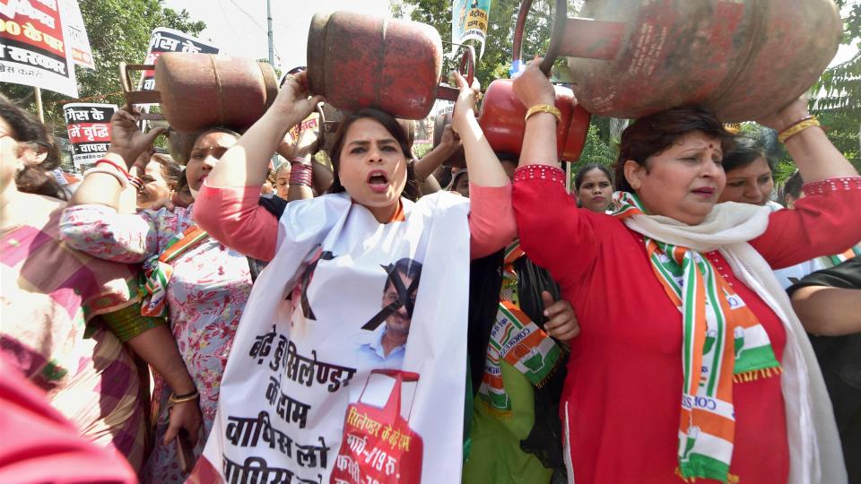 Delhi Pradesh Mahila Congress- wing President Amrita Dhawan (C), along with party activists, stages a protest over hike in LPG cylinder and fuel prices, outside BJP HQ in New Delhi, Tuesday, 2 March, 2021.