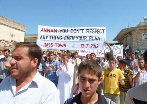 A handout picture released by the Syrian opposition's Shaam News Network shows an anti-regime demonstration in Hass