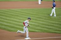Washington Nationals Trea Turner runs the bases after hitting a home run as New York Mets starting pitcher Rick Porcello reacts during the first inning of a baseball game Tuesday, Aug. 11, 2020, in New York. (AP Photo/Frank Franklin II)