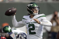 FILE - New York Jets quarterback Zach Wilson passes during the first half of an NFL football game against the Tennessee Titans, Sunday, Oct. 3, 2021, in East Rutherford. Zach Wilson will return as the New York Jets' starting quarterback Sunday, Nov. 28, 2021 against the Texans in Houston, according to a person with direct knowledge of the decision.(AP Photo/Bill Kostroun, File)