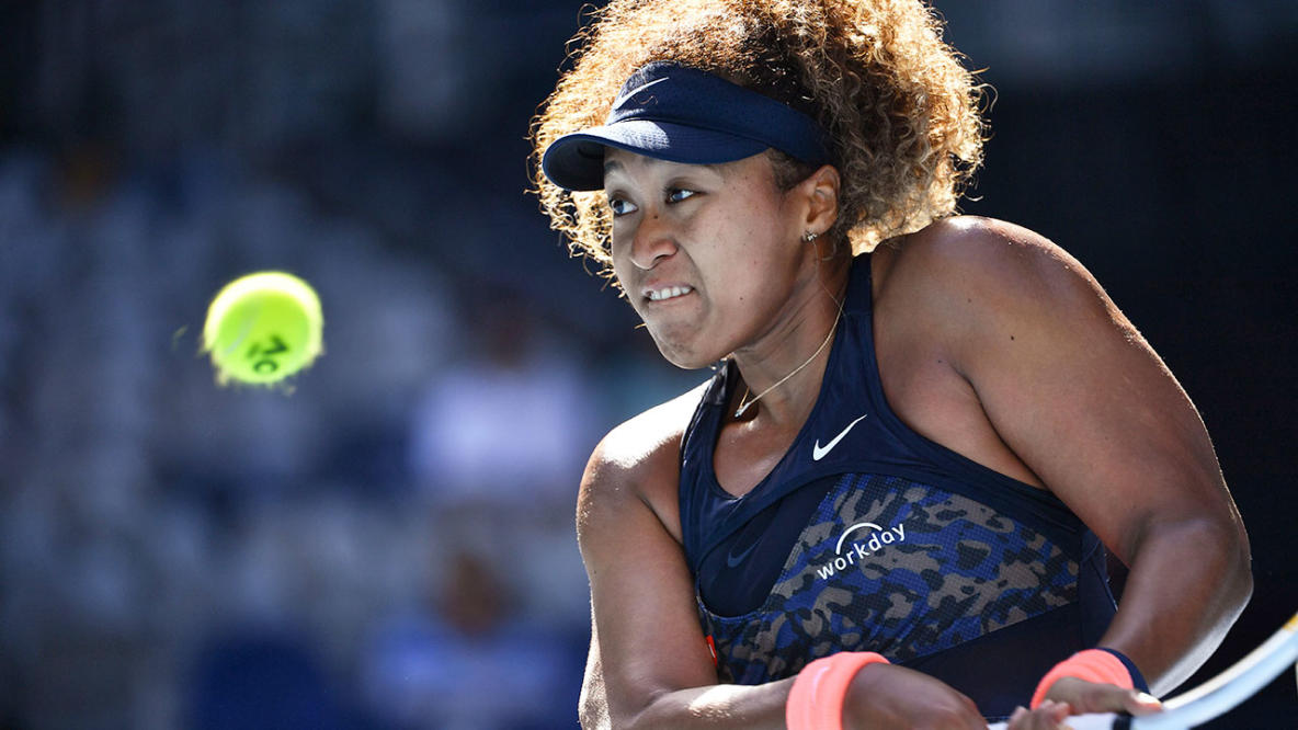 Naomi Osaka gently blessed by a butterfly during her match vs