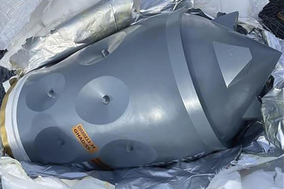 This image released by the U.S. Department of Justice in an FBI affidavit filed in U.S. District Court, Alexandria, Va., shows what is described as an Iranian-made warhead bound for Yemen's Houthi, seized off a vessel in the Arabian Sea. Four foreign nationals were charged Thursday, Feb. 22, 2024, with transporting suspected Iranian-made weapons on a vessel intercepted by U.S. naval forces in the Arabian Sea the previous month. Two Navy SEALs died during the mission. (U.S. Department of Justice via AP, File)