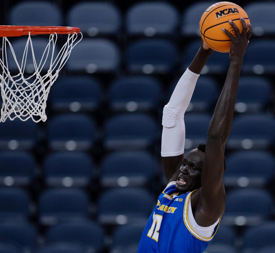New Haven's Majur Majak (12) hauls in a rebound against West Liberty during their NCAA Division II quarterfinal game at Ford Center in Evansville, Ind., Tuesday afternoon, March 21, 2023.