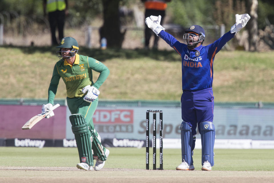 Indian wicketkeeper appeals for a wicket while South Africas Quinton De Kock looks on during the second ODI match between South Africa and India in Paarl, South Africa, Friday, Jan. 21, 2022. (AP Photo/Halden Krog)