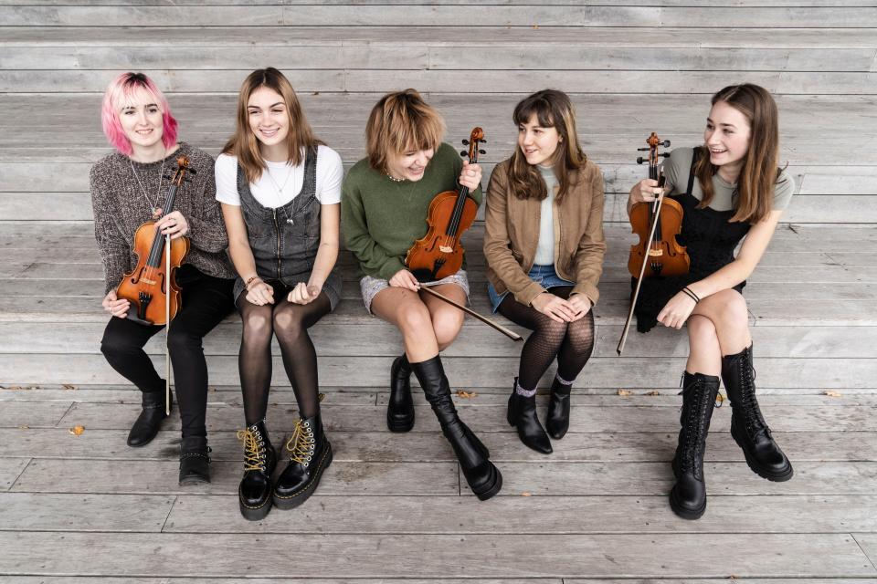 The Celtic band Scottish Fish, are, from left, Julia Homa, of Wellesley, and Ava Montesi, Maggie MacPhail, Giulia Haible and Caroline Dressler, all of Arlington.