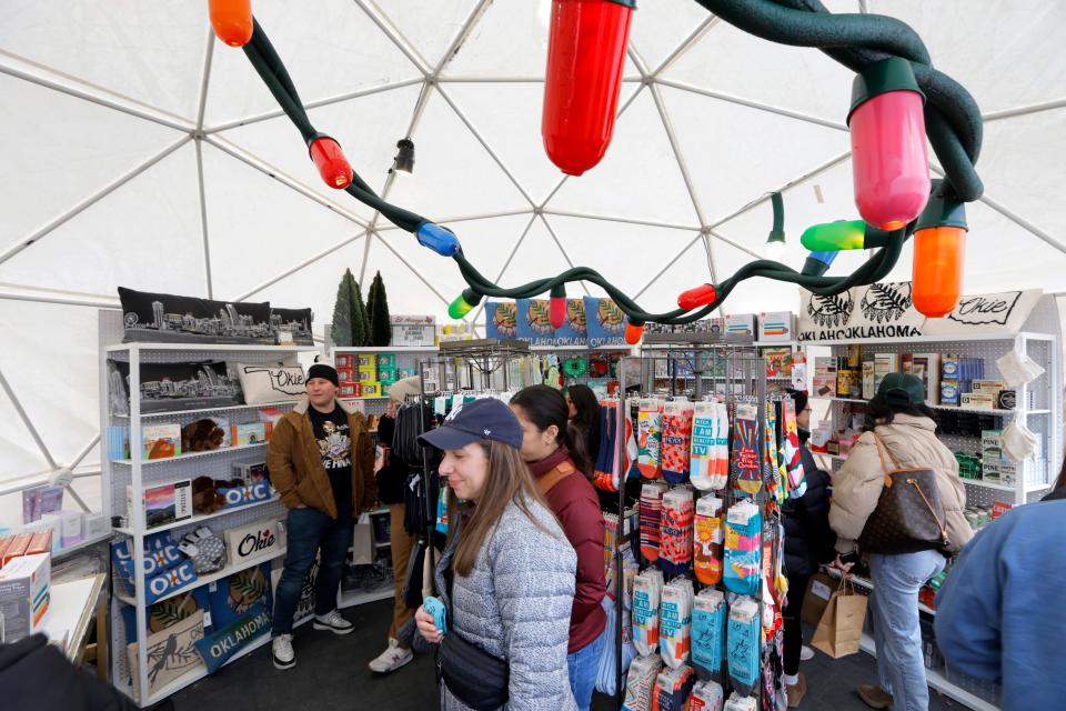 People shop in Midtown at the Holiday Pop-Up Shops in Oklahoma City, Saturday, Nov. 25, 2023. The Holiday Pop-Up Shops, located at 399 NW 10 St. in Midtown, are open Friday through Sunday until December 17.