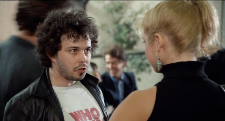 Man staring at woman in "Revenge of the Nerds II"