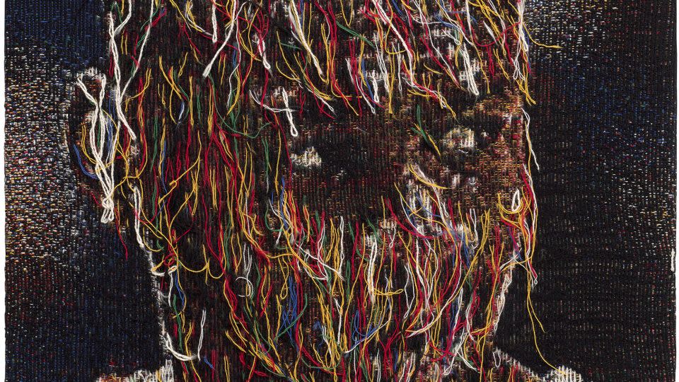 Noel Anderson obscures a Black portrait in his textile piece,"Michael in Sound Suit," (2019). Akinkugbe hopes the exhibition shows the "sprawling" nature of Black figurative art. - Courtesy Opera Gallery