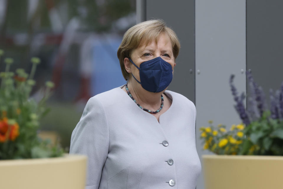 German Chancellor Angela Merkel arrives for a leadership meeting of the Christian Democratic Union (CDU) and the Bavarian Christian Social Union (CSU) in Berlin, Sunday June 20, 2021, on the eve of the unveiling of their electoral program ahead of the September general election. (Odd Andersen/Pool via AP)