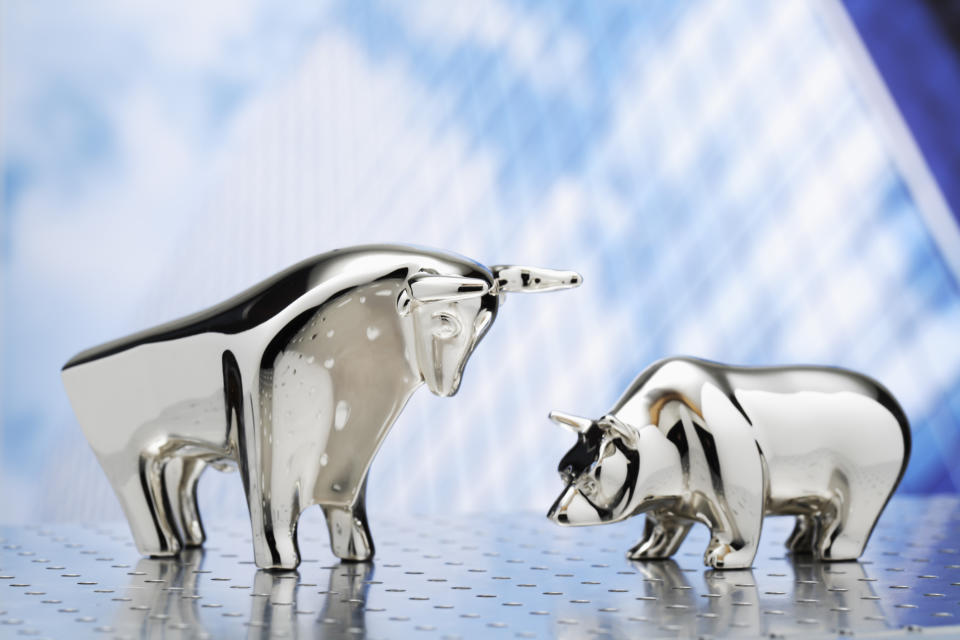 Metal bull and bear figurines.