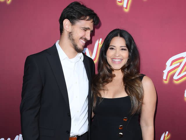 <p>Steve Granitz/FilmMagic</p> Joe Locicero and Gina Rodriguez at the Los Angeles Special Screening of 'Flamin' Hot' in June 2023.