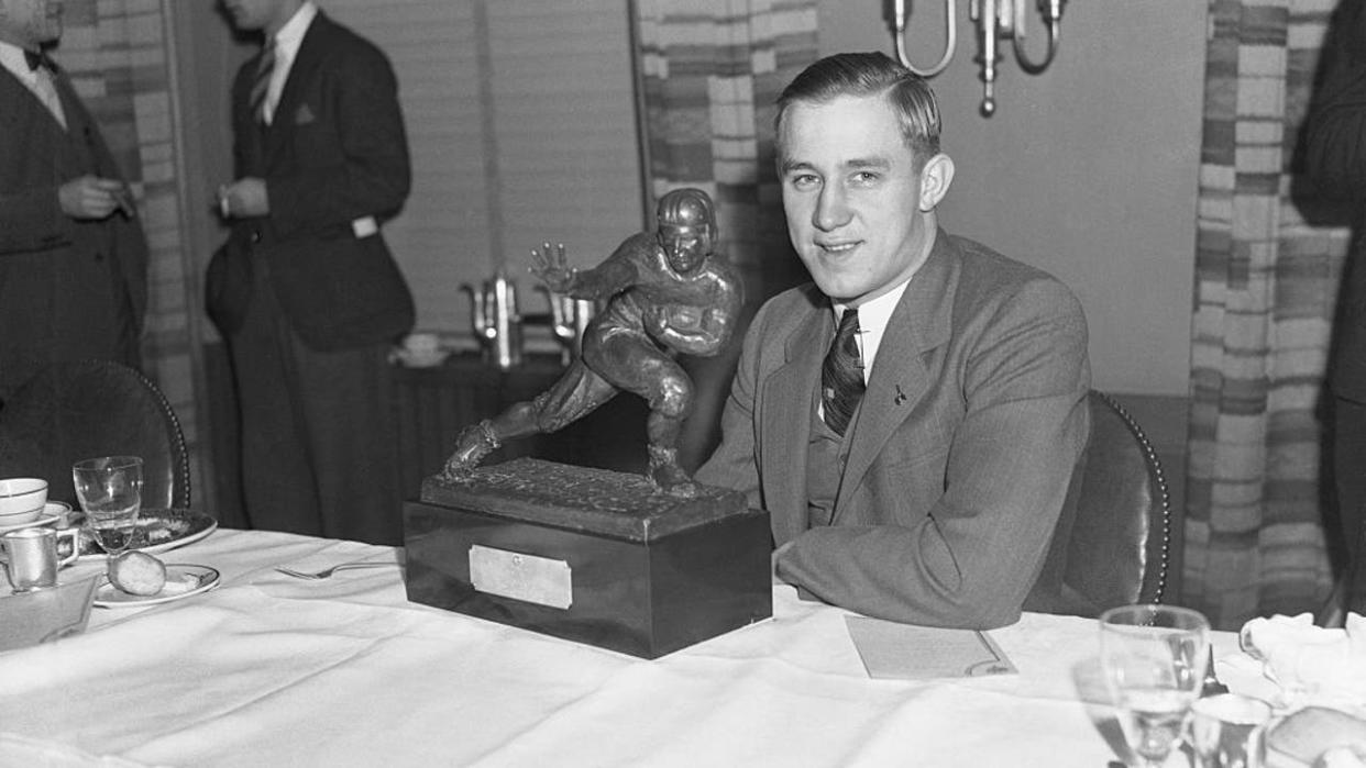 <div>(Original Caption) New York: The All All-America of 1935--A close up of Jay Berwanger, ace backfield man of the University of Chicago, shown holding the bronze trophy of the downtown Athletic Club, with which he was presented today, December 10th, after his selection as the Outstanding Football Player of 1935. Berwanger is the only football player in the country to have been selected on All All-America Teams.</div>