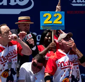 Oxford's Geoffrey Esper, right, was unable to overcome the appetite of favorite Joey Chestnut.