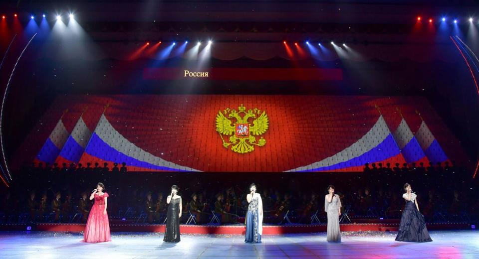 North Korean singers perform onstage for Kim Jong Un and Vladimir Putin.