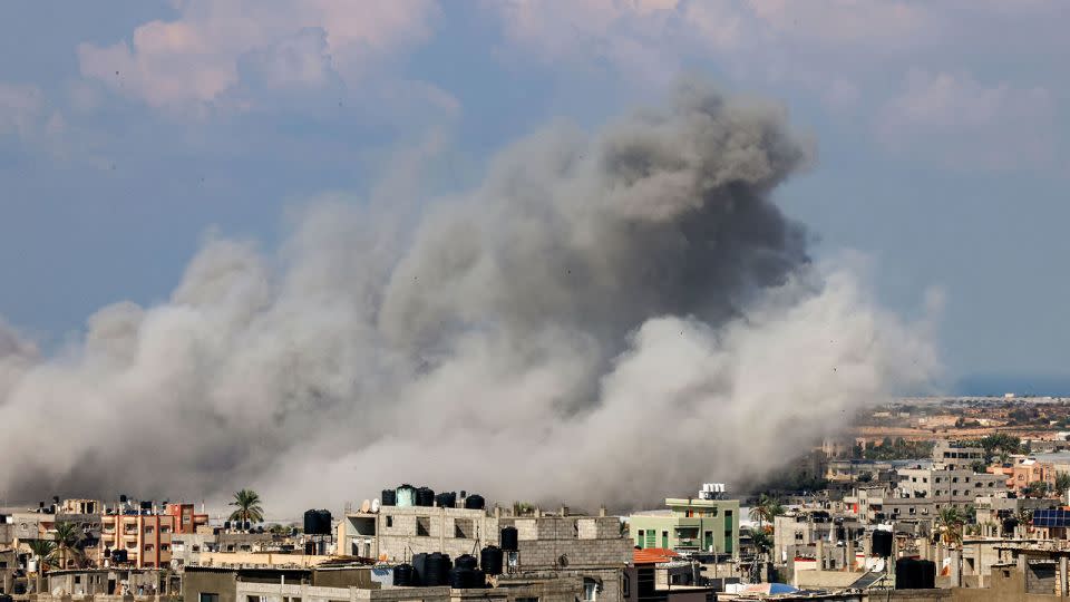 TOPSHOT - Smoke billows after an Israeli air strike in Rafah in the southern Gaza Strip on October 16, 2023. The death toll from Israeli strikes on the Gaza Strip has risen to around 2,750 since Hamas's deadly attack on southern Israel last week, the Gaza health ministry said October 16. Some 9,700 people have also been injured as Israel continued its withering air campaign on targets in the Palestinian coastal enclave, the Hamas-controlled ministry added. (Photo by SAID KHATIB / AFP) (Photo by SAID KHATIB/AFP via Getty Images) - Said Khatib/AFP/Getty Images