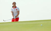 FILE PHOTO: 2016 Rio Olympics - Golf - Women's Individual Stroke Play - Olympic Golf Course - Rio de Janeiro, Brazil - 18/08/2016. Xiyu Lin (CHN) of China watches her chip shot on to the second green during second round women's Olympic golf competition. REUTERS/Kevin Lamarque/File Photo