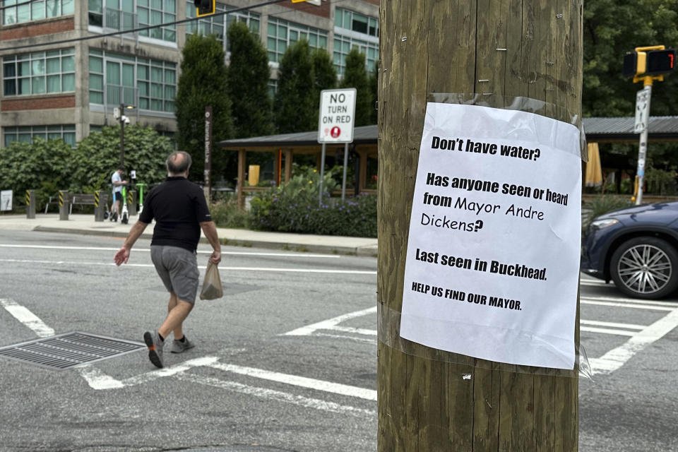 A sign expressing frustration with the city of Atlanta's response after corroding water pipes causing interruptions in water service to homes and businesses are seen along the Beltline trail in the city's Reynoldstown neighborhood on Saturday, June 1, 2024. Atlanta officials were slowly re-pressuring the city's water system Saturday after corroding water pipes burst in downtown and Midtown, forcing many businesses and attractions to close and affecting water service in area homes. (AP Photo/Kate Brumback)