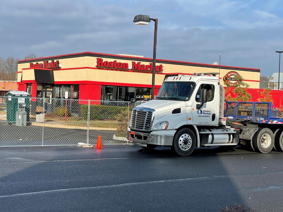 Construction fencing has gone up at the former Boston Market on Route 35 in Middletown. Township officials have said Starbucks is converting the store into a cafe.