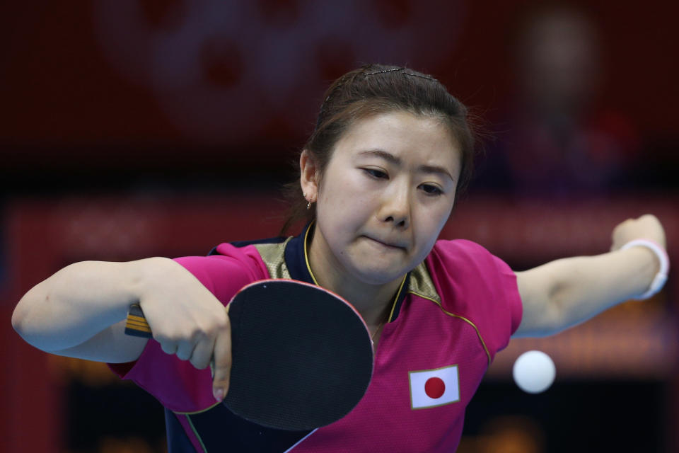 LONDON, ENGLAND - JULY 29: Ai Fukuhara of Japan plays a backhand in her Women's Singles Table Tennis third round match against Anna Tikhomirova of Russia on Day 2 of the London 2012 Olympic Games at ExCeL on July 29, 2012 in London, England. (Photo by Feng Li/Getty Images)