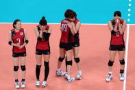 LONDON, ENGLAND - AUGUST 11: Japan celebrates after defeating Korea to win the Women's Volleyball bronze medal match on Day 15 of the London 2012 Olympic Games at Earls Court on August 10, 2012 in London, England. (Photo by Ezra Shaw/Getty Images)