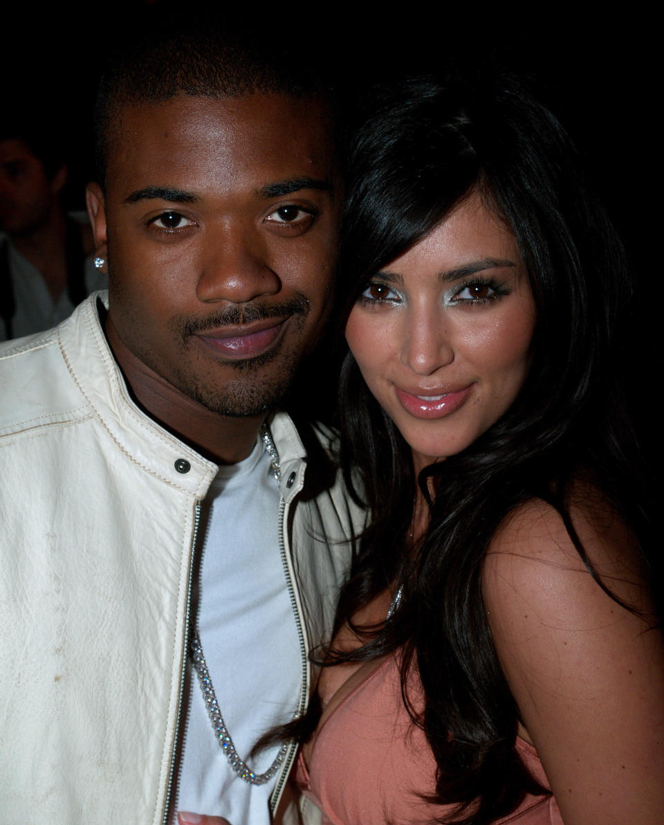 Ray J and Kim Kardashian posing together