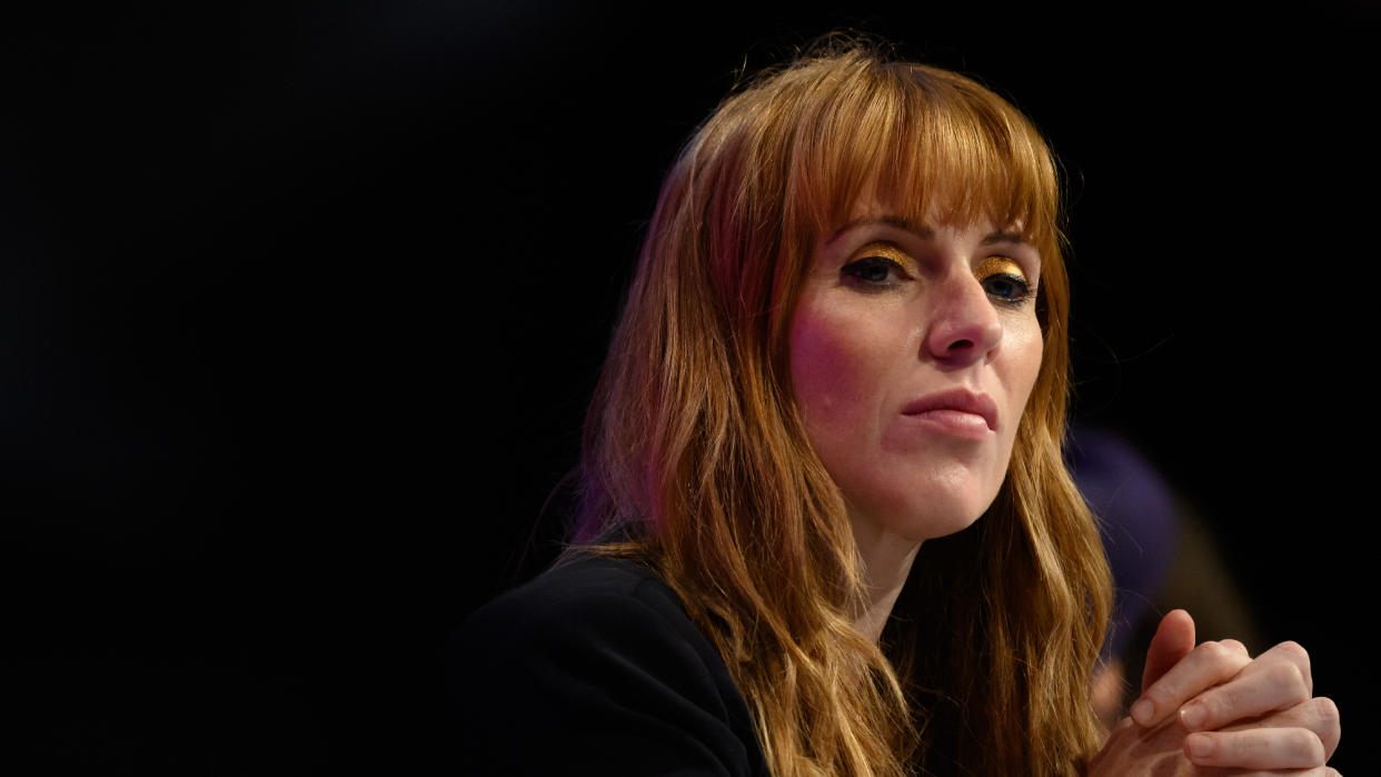  A tight shot of Angela Rayner's head with her hands clasped. 