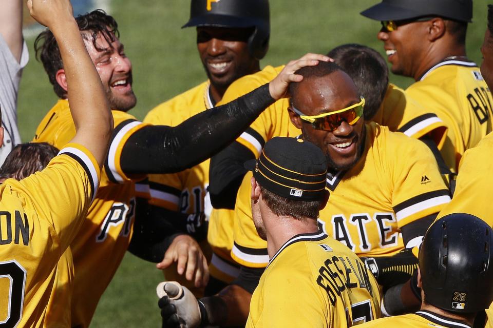 Starling Marte collected three straight hits before hitting a walkoff home run in the 10th inning. (AP Photo/Gene J. Puskar)