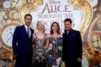 Cast members (L-R) Sacha Baron Cohen, Mia Wasikowska, Anne Hathaway and Johnny Depp pose at the premiere of "Alice Through the Looking Glass" at El Capitan theatre in Hollywood, U.S., May 23, 2016. REUTERS/Mario Anzuoni/File Photo