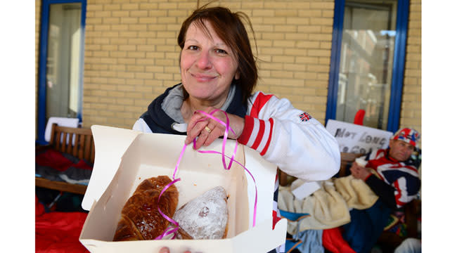 The royal baby craze is in full effect and Prince William and Kate Middleton fueled the festivities when they surprised superfans with breakfast on Tuesday. But did they also leave a clue as to the sex of their second child? People are already camped out in the chilly England weather across the street from the private Lindo Wing of St. Mary's Hospital where the Duchess of Cambridge is to give birth. <strong> PHOTOS: Kate Middleton's Royal Maternity Styles </strong> Showing kindness towards their superfans, Will and Kate sent over coffee, croissants and pastries to the dedicated campers. <strong> NEWS: 11 Perks of Being the Second Royal Baby </strong> The treats came in two white boxes that were tied with pink ribbons, thus begging the question: Is the royal couple is expecting a girl? Splash News Kate, 33, is due "mid-to-end of April," which explains all the fanfare. The royals have yet to reveal if their baby-to-be is a boy or girl, but it seems like everyone is hoping for a baby girl, at least according to those placing bets! Getty Images The royal couple first announced they were expecting on Sept. 8 of last year. Their oldest child, Prince George, will turn two on July 22, just a few months after their second child's due date. <strong> What do you think? Is Kate having a boy or girl? </strong>