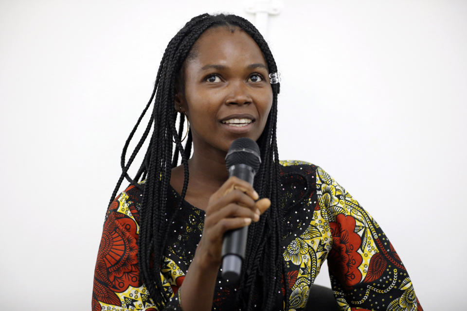 Jummai Mutah, one of the Chibok schoolgirls who was kidnapped in 2014 by Islamic extremists and later released, speaks during a 10th anniversary event of the abduction in Lagos, Nigeria, Thursday, April 4, 2024. A new film in Nigeria is being screened to remember the nearly 100 schoolgirls who are still in captivity ao years after they were seized from their school in the country’s northeast. At least 276 girls were kidnapped during the April 2014 attack that stunned the world, but most have since regained their freedom. (AP Photo/Mansur Ibrahim )