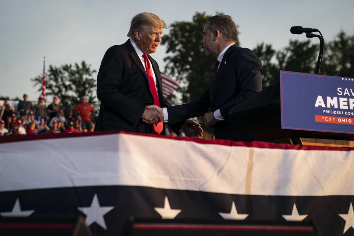 WELLINGTON, OHIO - JUNE 26: Former President Donald J. Trump speaks with Republican congressional candidate Mike Carey at a rally at the Lorain County Fairgrounds on Saturday, June 26, 2021 in Wellington, Ohio.(Photo by Jabin Botsford/The Washington Post via Getty Images)