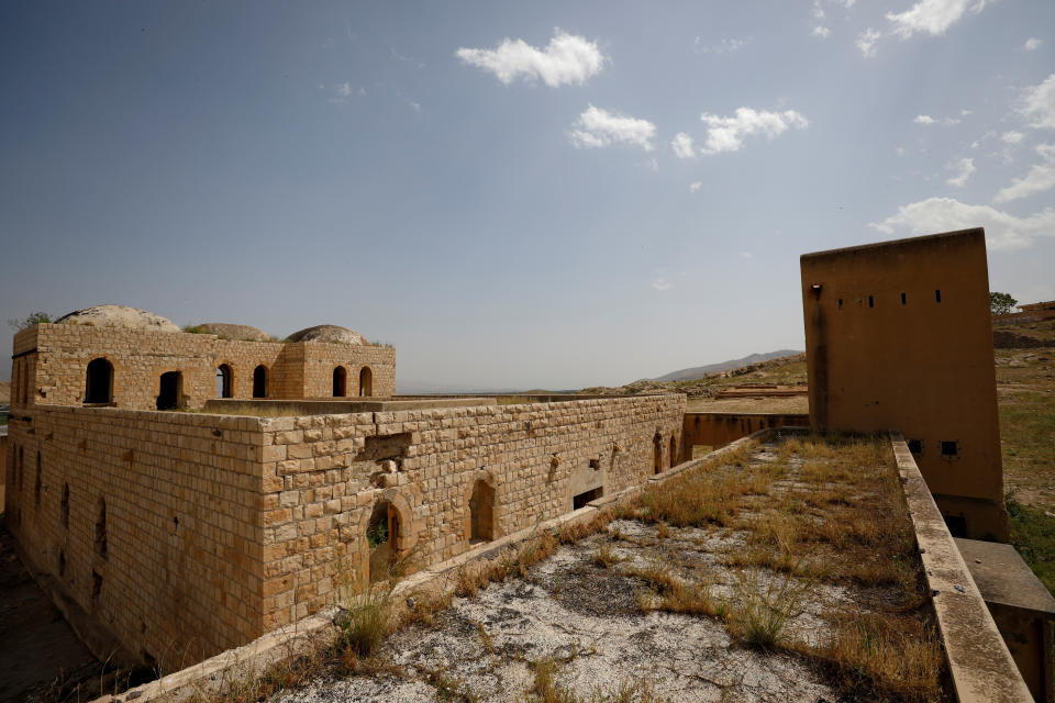 Buildings constructed during the British Mandate era to serve as jails and fortified positions are seen in Al-Jiftlik village near Jericho, in the Israeli-occupied West Bank, April 7, 2019. Long abandoned, sheep now wander through the empty buildings, searching for vegetation in the scorching heat of the Jordan Valley. The Israeli military sometimes uses them for training, Palestinian residents say.  (Photo: Ronen Zvulun/Reuters)