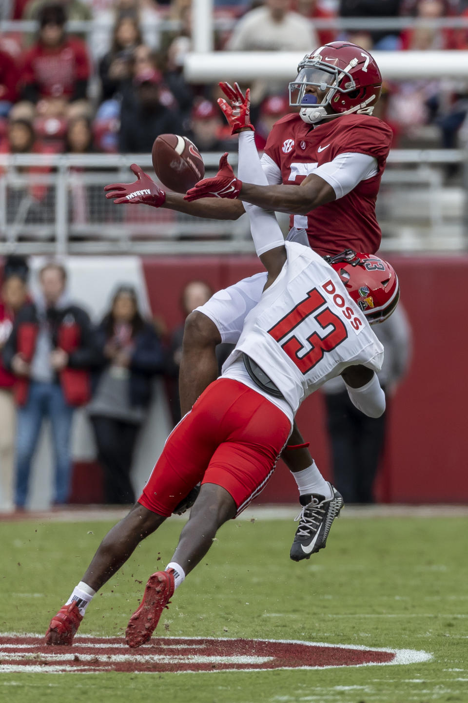 Austin Peay defensive back Cedarius Doss (13) deflects a pass meant for Alabama wide receiver Ja'Corey Brooks (7) during the first half of an NCAA college football game, Saturday, Nov. 19, 2022, in Tuscaloosa, Ala. (AP Photo/Vasha Hunt)