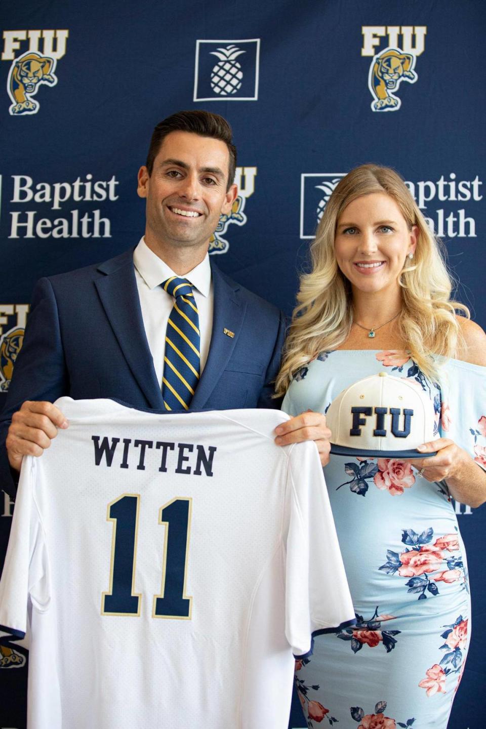 Newly appointed FIU Baseball Coach Rich Witten (left) poses with his wife Natalie Kalibat Witten on Monday, June 27, 2022 at the FIU Baseball Stadium in Miami, Fla.