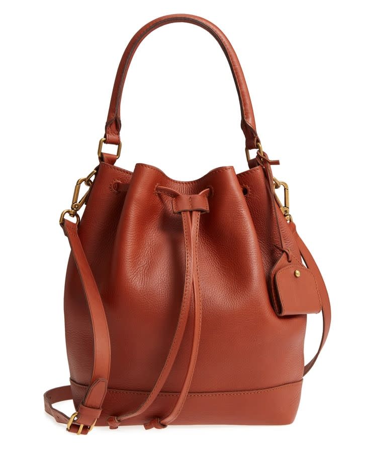 <strong>Sale</strong>: $129.90<br /><strong>Original</strong>: $198.00<br /><br /><a href="https://shop.nordstrom.com/s/madewell-lafayette-leather-bucket-bag/4926241?origin=category-personalizedsort&amp;breadcrumb=Home%2FAnniversary%20Sale%2FWomen&amp;color=english%20saddle" target="_blank">Get it here</a>.