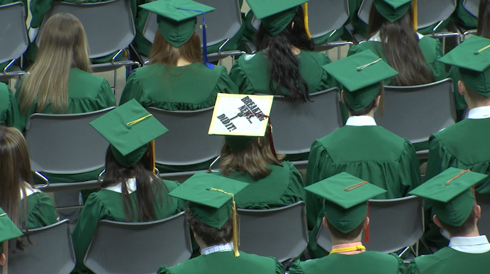 MSU graduates partake in a commencement ceremony. (Photo/Michigan State University)