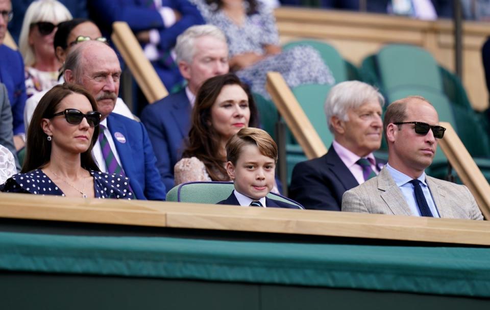 The Duke and Duchess of Cambridge with Prince George in the Royal Box at Wimbledon during the men’s final (Adam Davy/PA) (PA Wire)