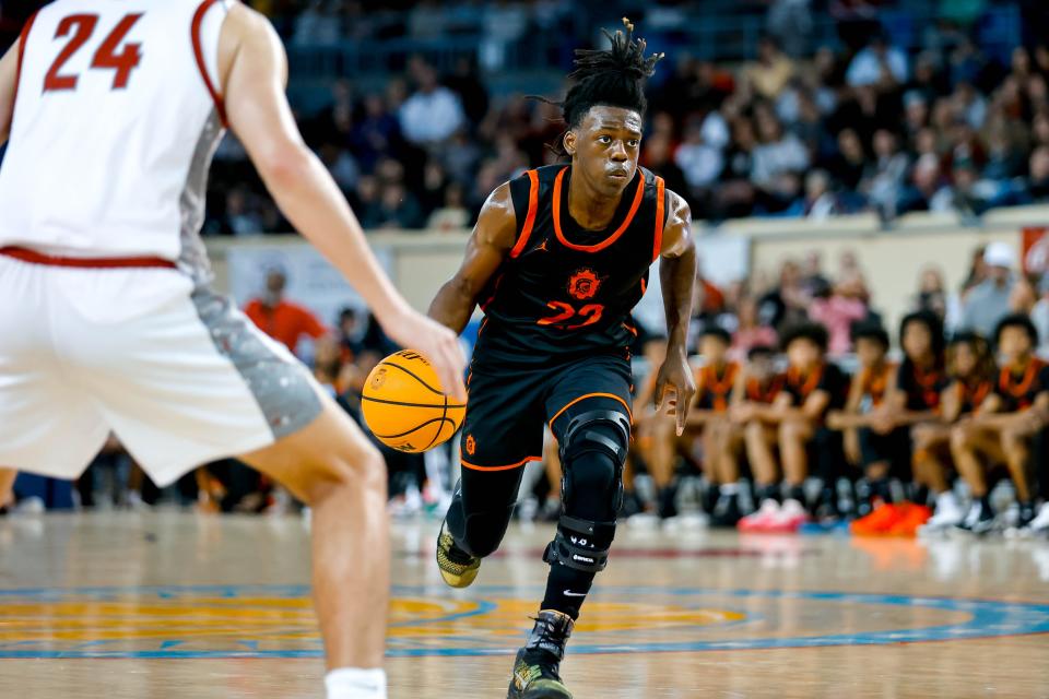 Douglass’ Landry Ballard Jr. (22) works up court during the championship of the boys state basketball tournament between Douglass and Weatherford at the Jim Norick Arena in Oklahoma City, on Saturday, March 9, 2024.