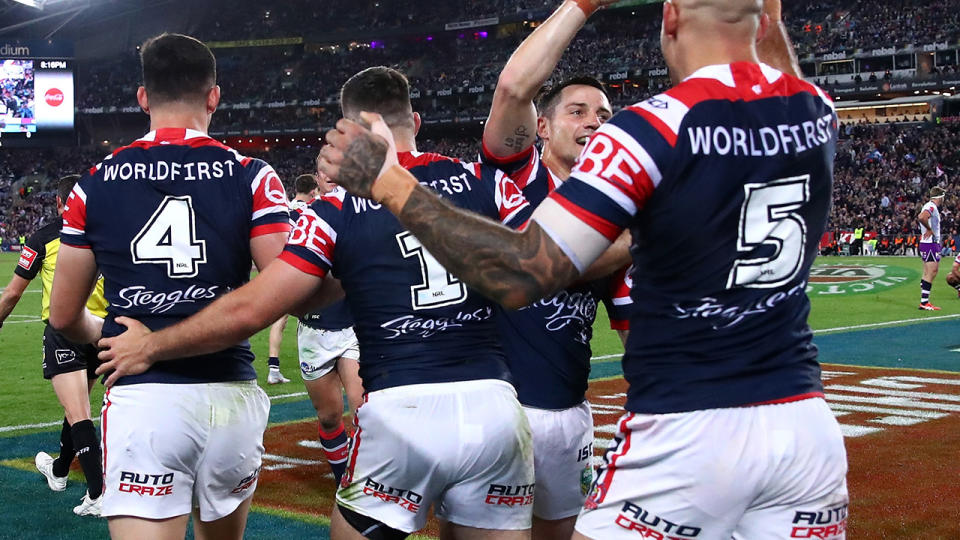 Cooper Cronk and Blake Ferguson celebrate. (Photo by Cameron Spencer/Getty Images)