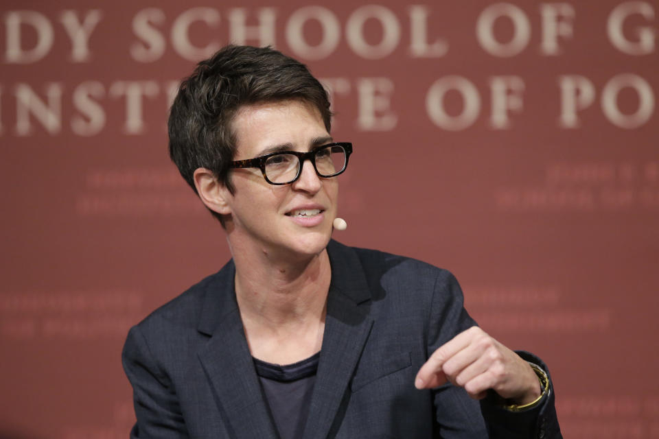FILE - MSNBC television anchor Rachel Maddow, host of "The Rachel Maddow Show," moderates a panel at the John F. Kennedy School of Government, at Harvard University, in Cambridge, Mass., on Oct. 16, 2017. In the past few weeks, NBC reversed a decision to hire former Republican National Committee head Ronna McDaniel as a political contributor following a revolt by some of its best-known personalities, including Maddow, and others. (AP Photo/Steven Senne, File)