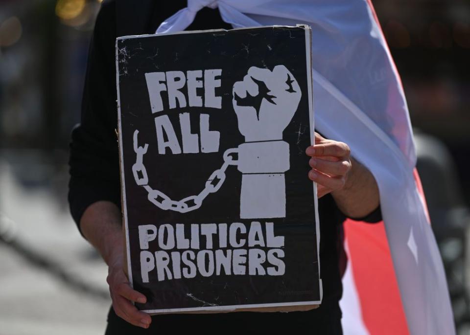 Members of the local Belarusian and Ukrainian diaspora, joined by dedicated activists, gather at the central Market Square in Krakow for the 'Freedom to Political Prisoners of Belarus' protest on May 21, 2023, in Krakow, Poland. (Artur Widak/NurPhoto via Getty Images)