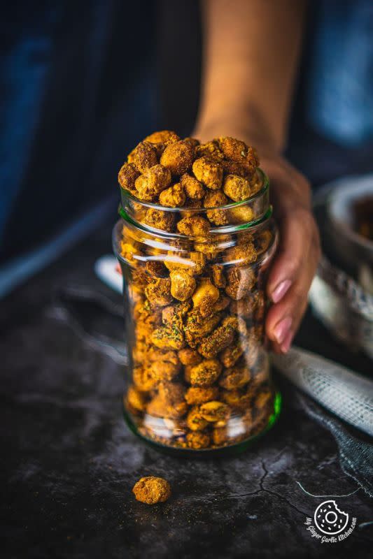 <p>My Ginger Garlic Kitchen</p><p>These crunchy and spicy coated peanuts are one of the most popular Indian snacks made using spicy gram flour coating and raw peanuts. </p><p><strong>Get the recipe here: <a href="https://www.mygingergarlickitchen.com/masala-peanuts/" rel="nofollow noopener" target="_blank" data-ylk="slk:Masala Peanuts;elm:context_link;itc:0;sec:content-canvas" class="link ">Masala Peanuts</a></strong></p>