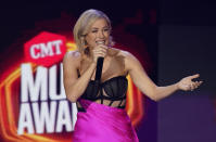 Iliza Shlesinger presents the award for collaborative video of the year at the CMT Music Awards at the Bridgestone Arena on Wednesday, June 9, 2021, in Nashville, Tenn. (AP Photo/Mark Humphrey)