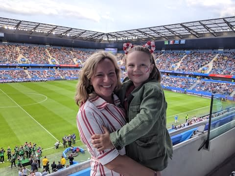 Sally with her daughter at the stadium