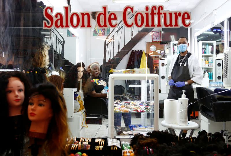 Hairdresser Nicky Chou poses in her hair salon at the Matonge gallery in Brussels