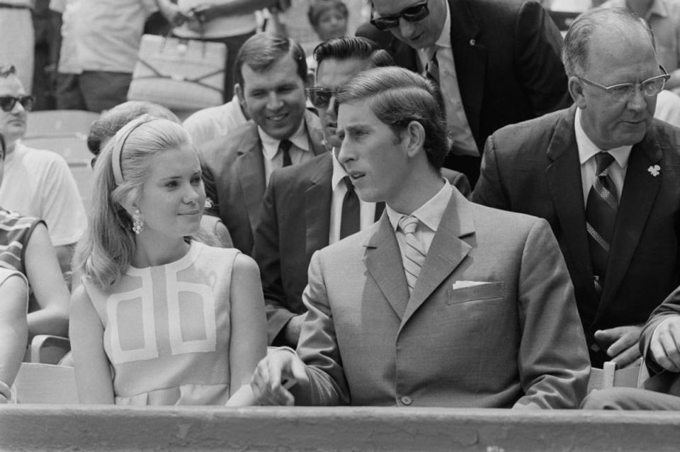 Prince Charles sits with Tricia Nixon, daughter of the American President, during a baseball game at RFK Stadium in 1970 (Getty)